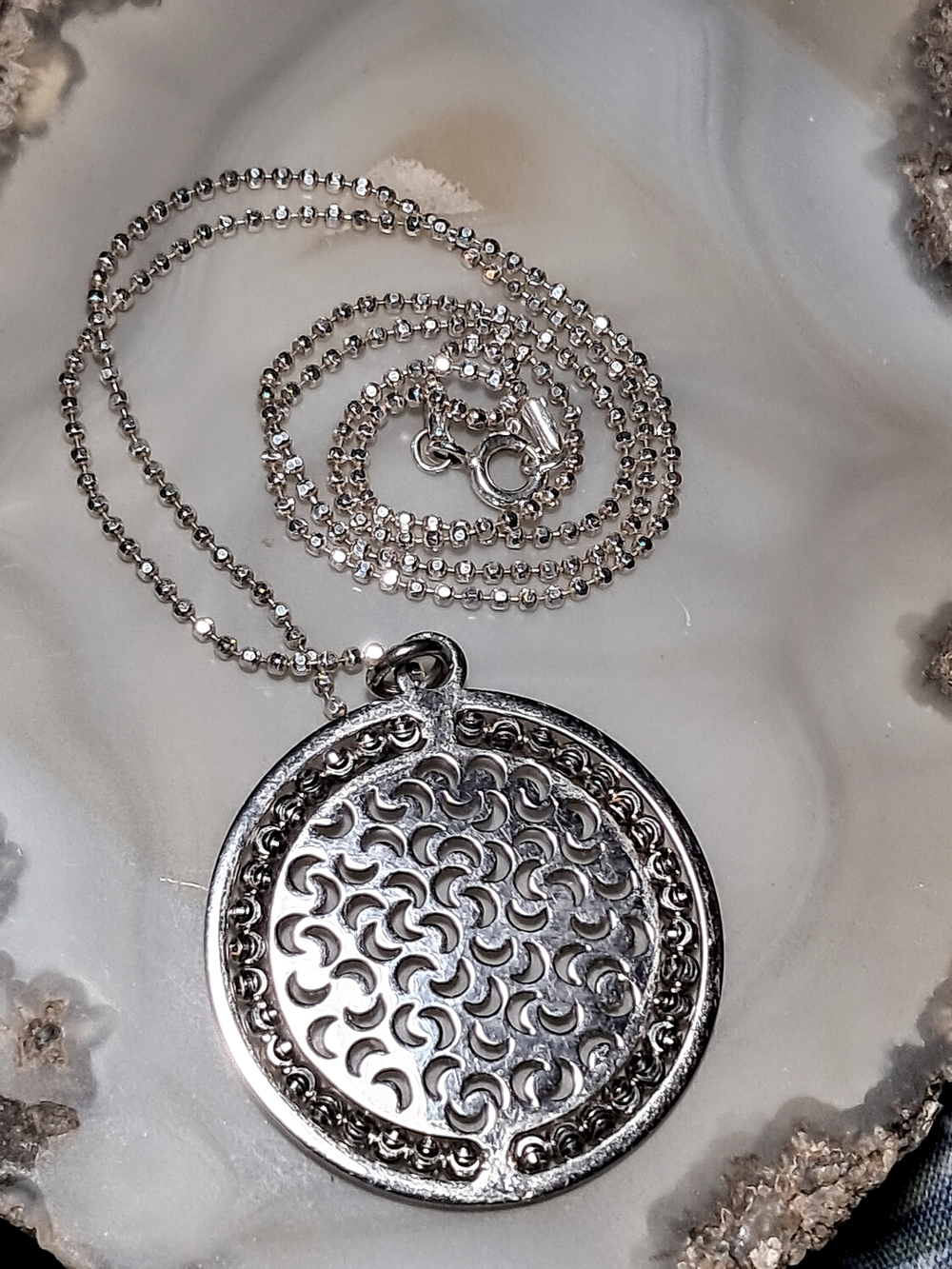 Sterling Crescent-Punched Rotating Bead Border Pendant Necklace